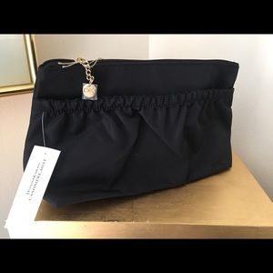 NWT. DK black nylon cosmetic case
